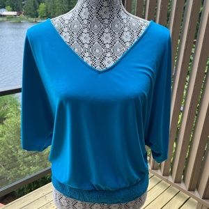 White House Black Market banded bottom blouse - Poly spandex - Size M